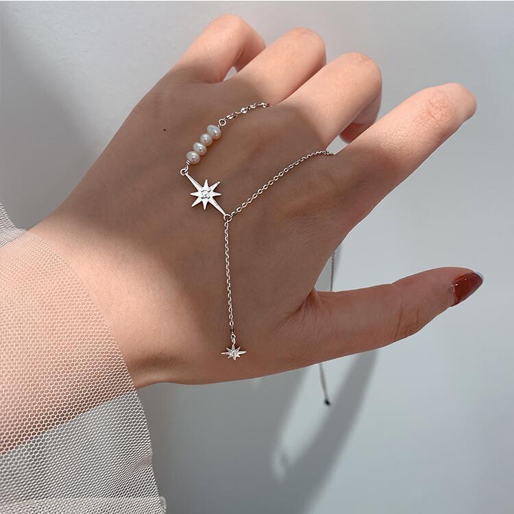 Eight-pointed star spliced ​​pearl necklace women's light luxury niche clavicle chain 2022 new style simple and high-end accessories