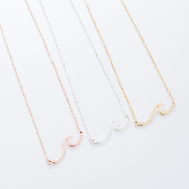 Golden European and American cross-border fashion stainless steel wave necklace women's pendant temperament wave spray necklace accessories