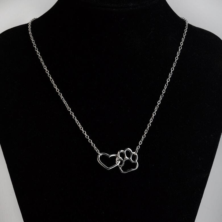 New product dog paw footprint peach heart necklace ins women's hollow love-shaped clavicle chain European and American popular manufacturers now wholesale