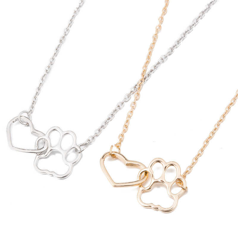 New product dog paw footprint peach heart necklace ins women's hollow love-shaped clavicle chain European and American popular manufacturers now wholesale