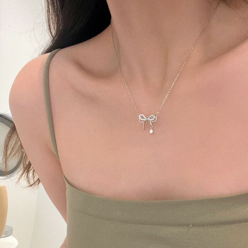Korean bow necklace silver geometric pendant small fresh diamond birthday gift niche design versatile jewelry