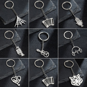 Simple foreign trade new accessories stainless steel musical instruments Halloween spider web creative keychain pendant pendant couple