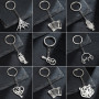 Simple foreign trade new accessories stainless steel musical instruments Halloween spider web creative keychain pendant pendant couple