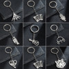 Simple foreign trade new accessories stainless steel musical instruments Halloween spider web creative keychain pendant pendant couple