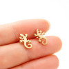 2025 Amazon New Stainless Steel Niche Cold Style Simple Personality Reptile Gecko Ear Nails Wholesale