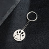 European and American cartoon cute animal footprints cat paw pendant keychain stainless steel geometric simple round heart-shaped pendant