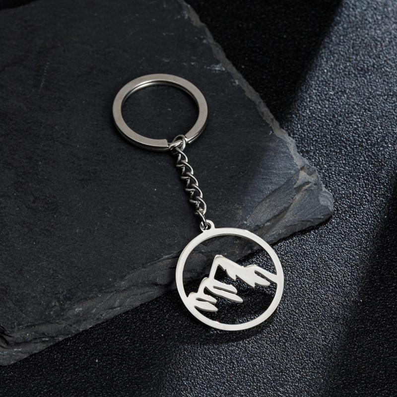 Simple stainless steel keychain European and American style simple geometric round hollow snow peak pendant accessories pendant