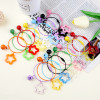 Ins style colorful five-pointed star bell keychain acrylic hollow pendant bag earphone cover keychain pendant