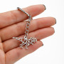 2025 stainless steel new product hollow origami cartoon dinosaur pendant keychain jewelry pendant hanging chain wholesale