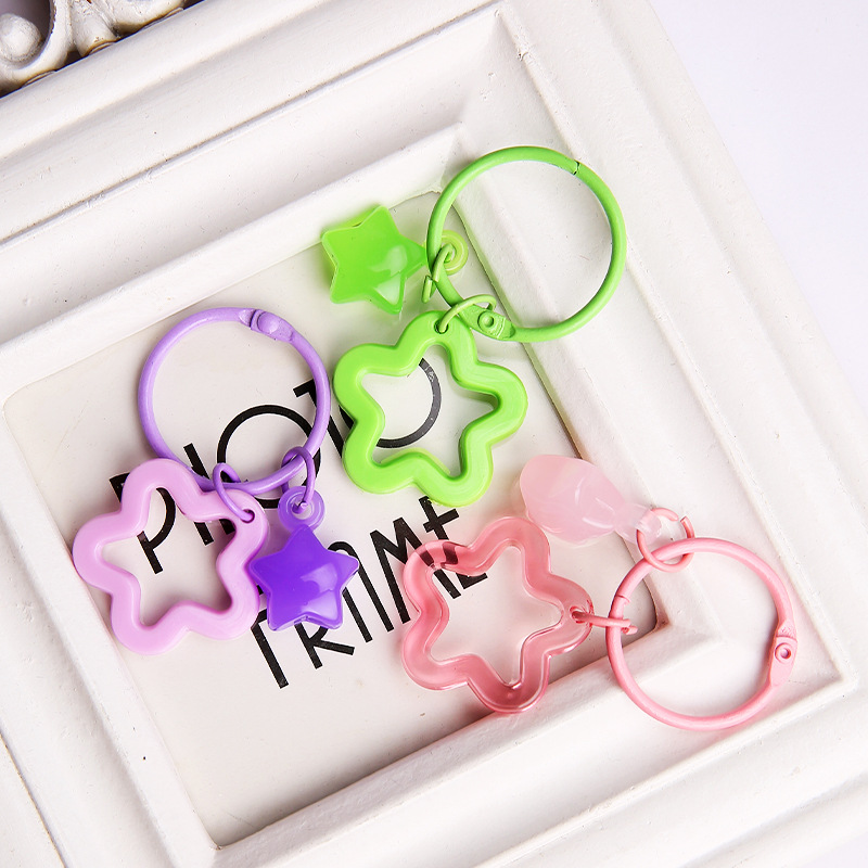 Creative handmade DIY colorful hollow five-pointed star and transparent five-pointed star keychain colorful painted bell pendant