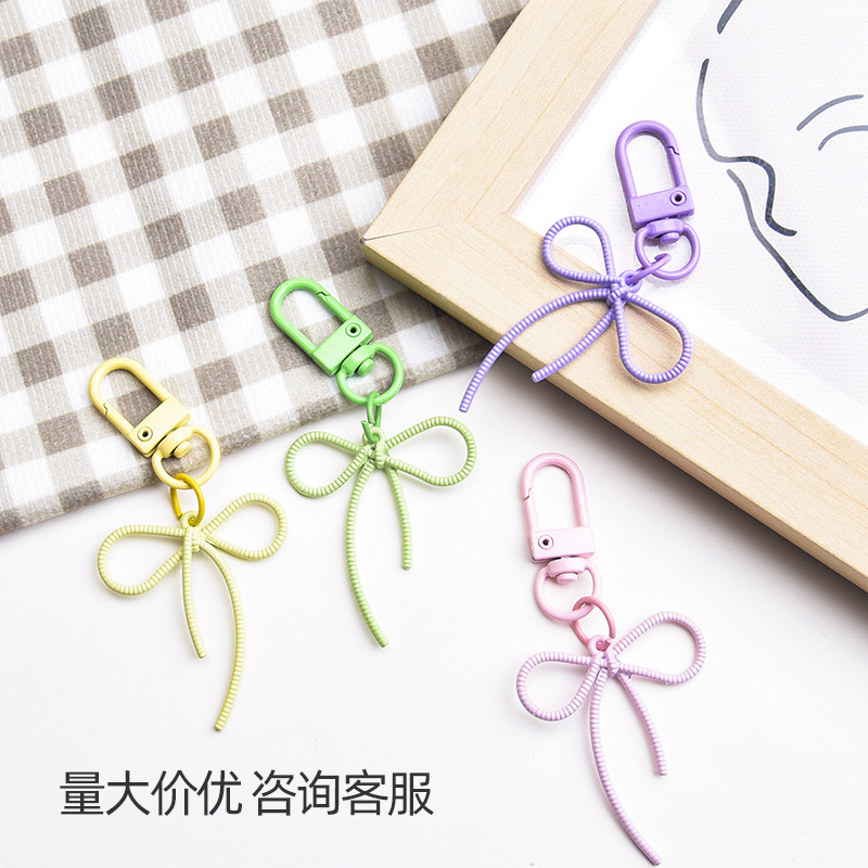 New style fugitive princess alloy hollow streamer bow keychain pendant colorful cute bag pendant wholesale