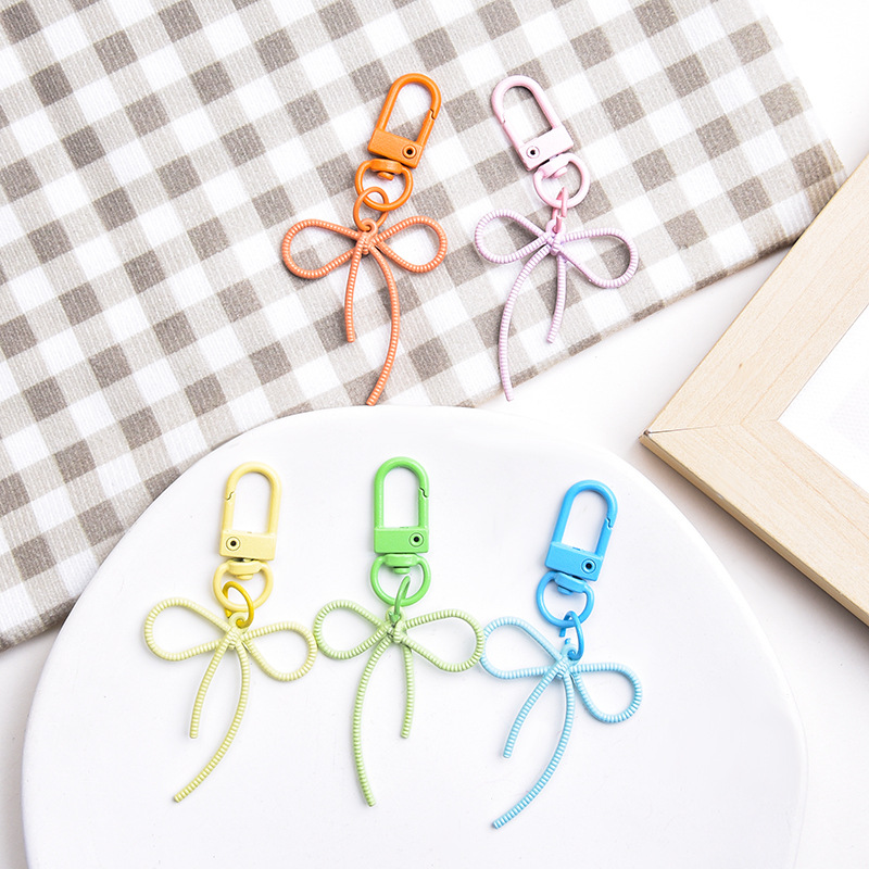 New style fugitive princess alloy hollow streamer bow keychain pendant colorful cute bag pendant wholesale