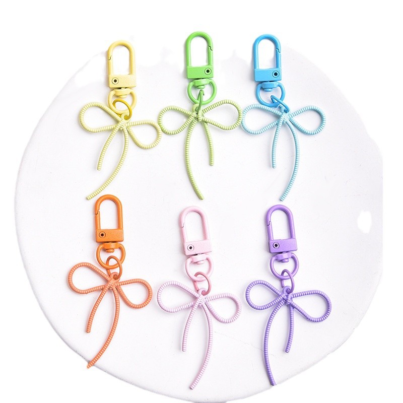 New style fugitive princess alloy hollow streamer bow keychain pendant colorful cute bag pendant wholesale