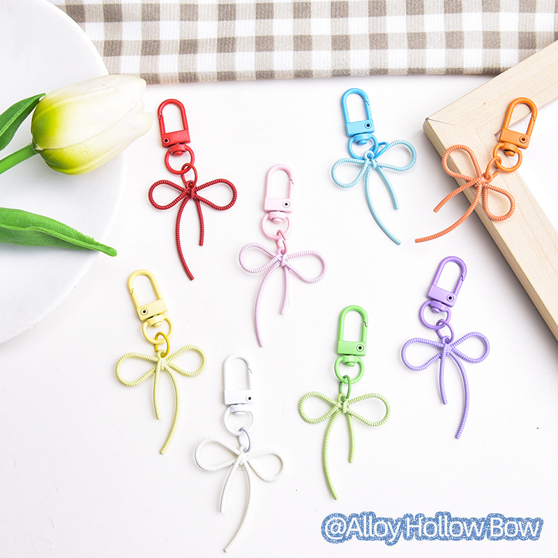 New style fugitive princess alloy hollow streamer bow keychain pendant colorful cute bag pendant wholesale
