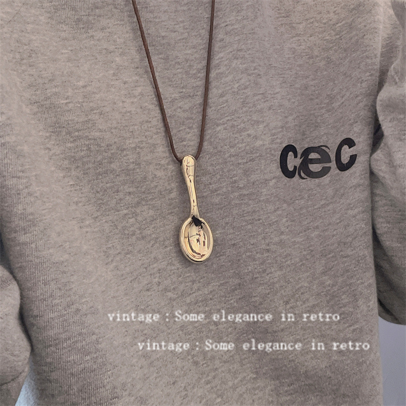 Eat and drink without worries, drawstring design spoon necklace for women 2025 new long sweater chain, light luxury and high-end accessories