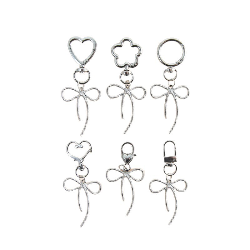 New idea zinc alloy sweet and cool hollow bow key pendant pendant necklace bracelet earrings accessories materials wholesale