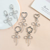 New idea zinc alloy sweet and cool hollow bow key pendant pendant necklace bracelet earrings accessories materials wholesale