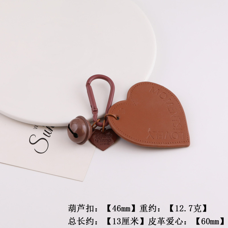 Creative new black leather love hollow star bow keychain bag pendant jewelry accessories