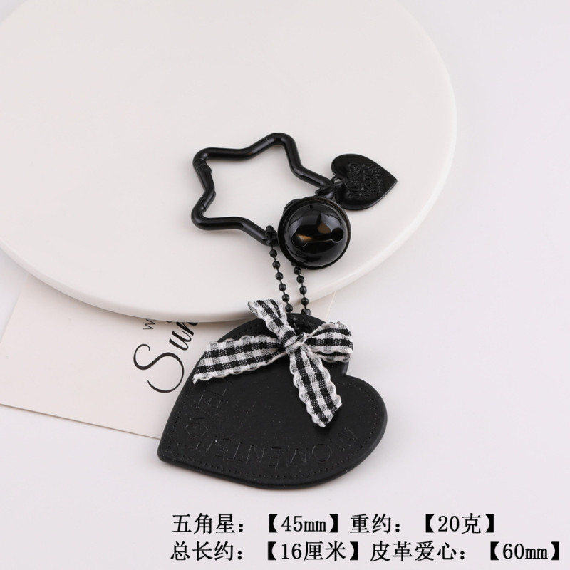 Creative new black leather love hollow star bow keychain bag pendant jewelry accessories