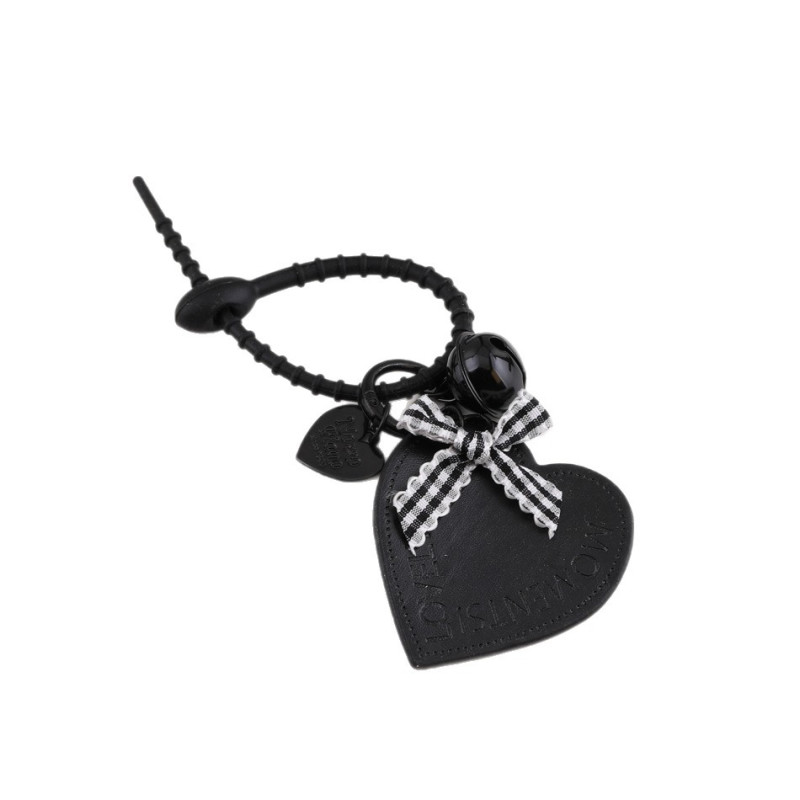 Creative new black leather love hollow star bow keychain bag pendant jewelry accessories